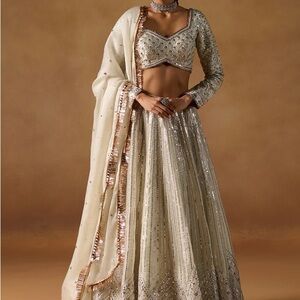 Cream and Gold Embellished Lehenga with Top and a Shoulder Wrap